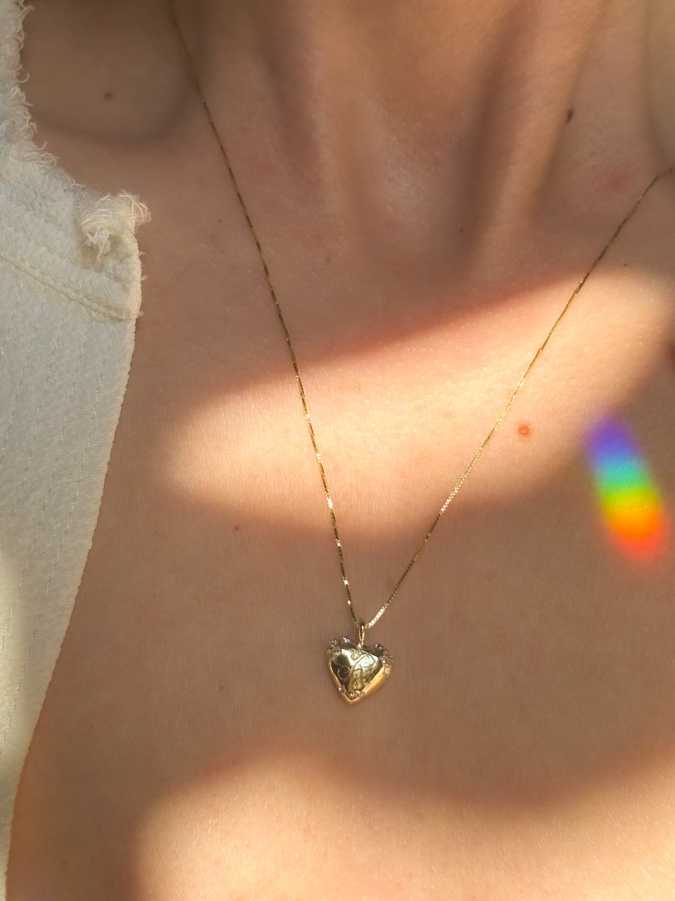 Pictured on a 14k yellow gold Box Chain