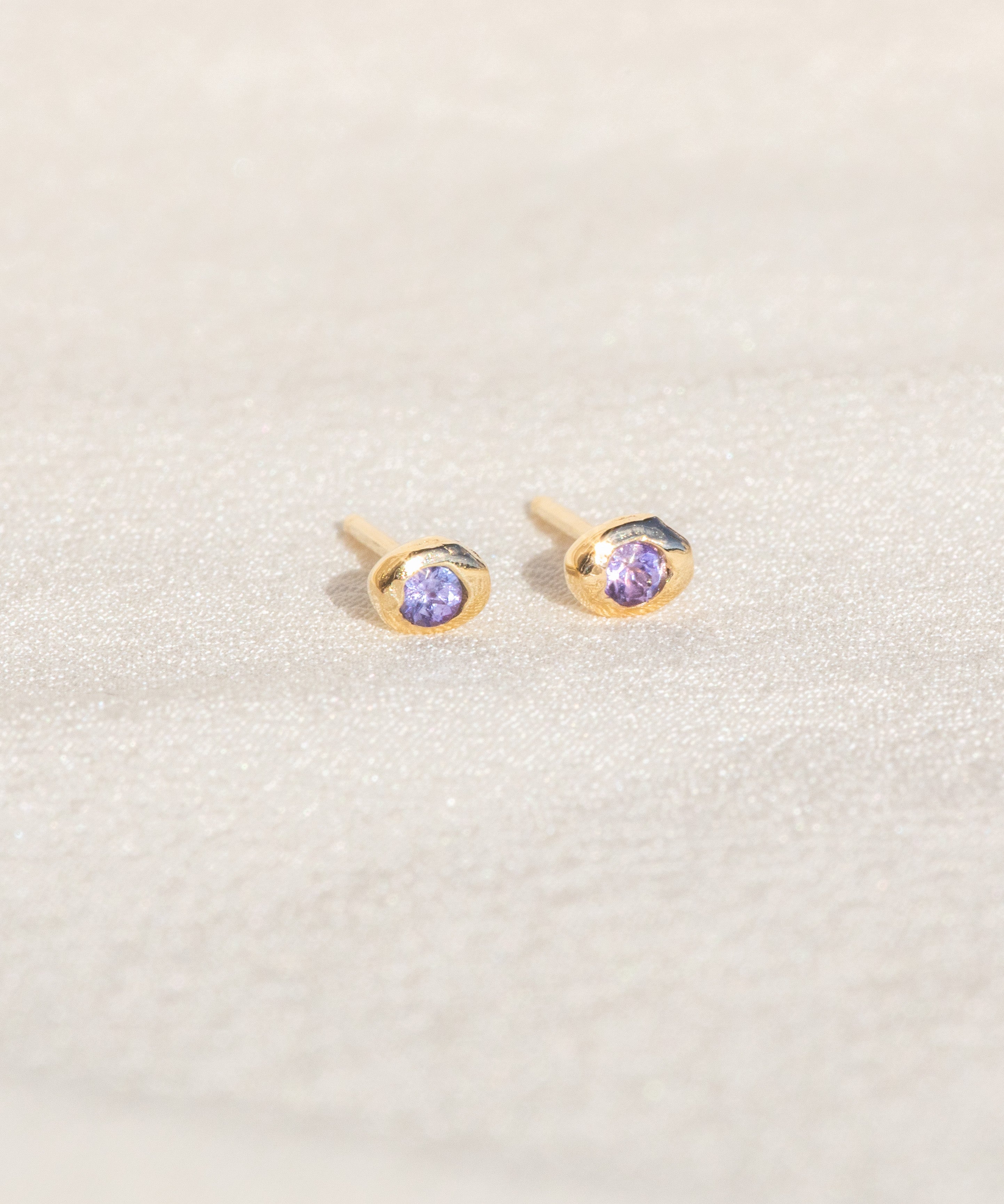 14kt Gold Studs featuring a 2mm Tanzanite