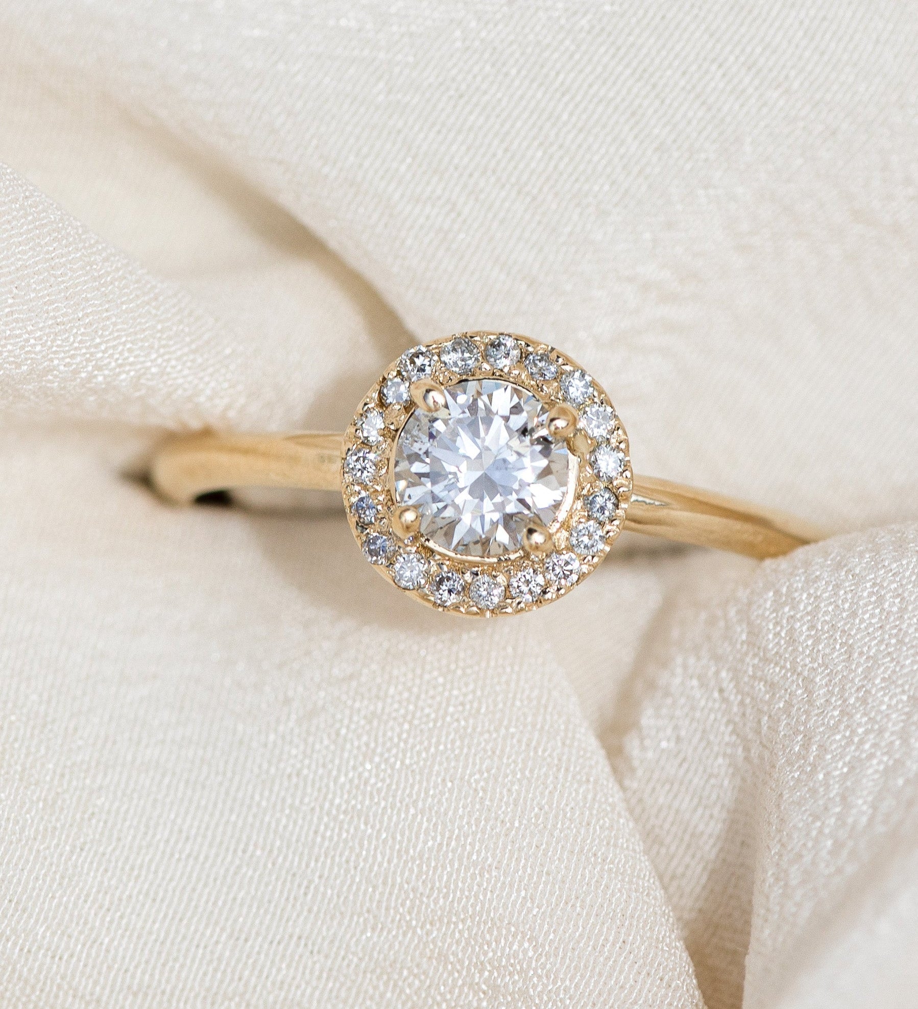 Bespoke engagement ring handcrafted in 14k gold with ethically sourced diamond
