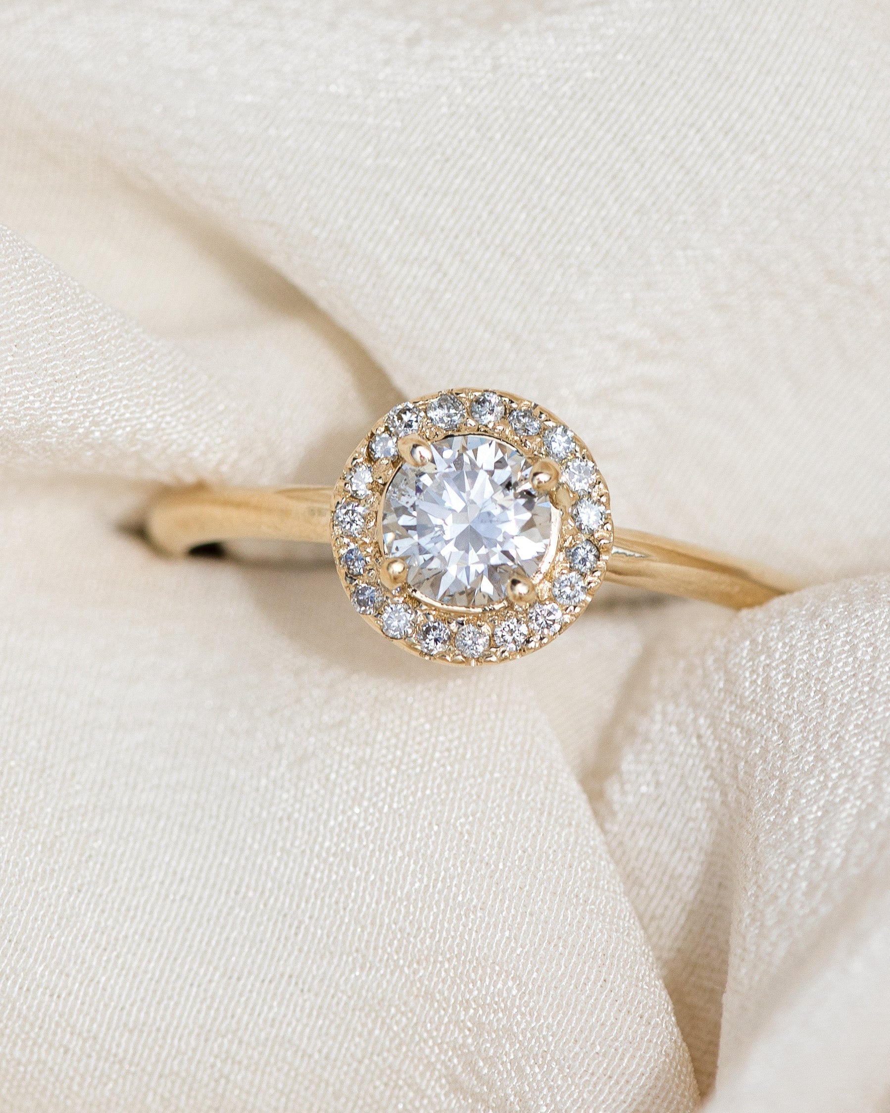 Bespoke engagement ring handcrafted in 14k gold with ethically sourced diamond