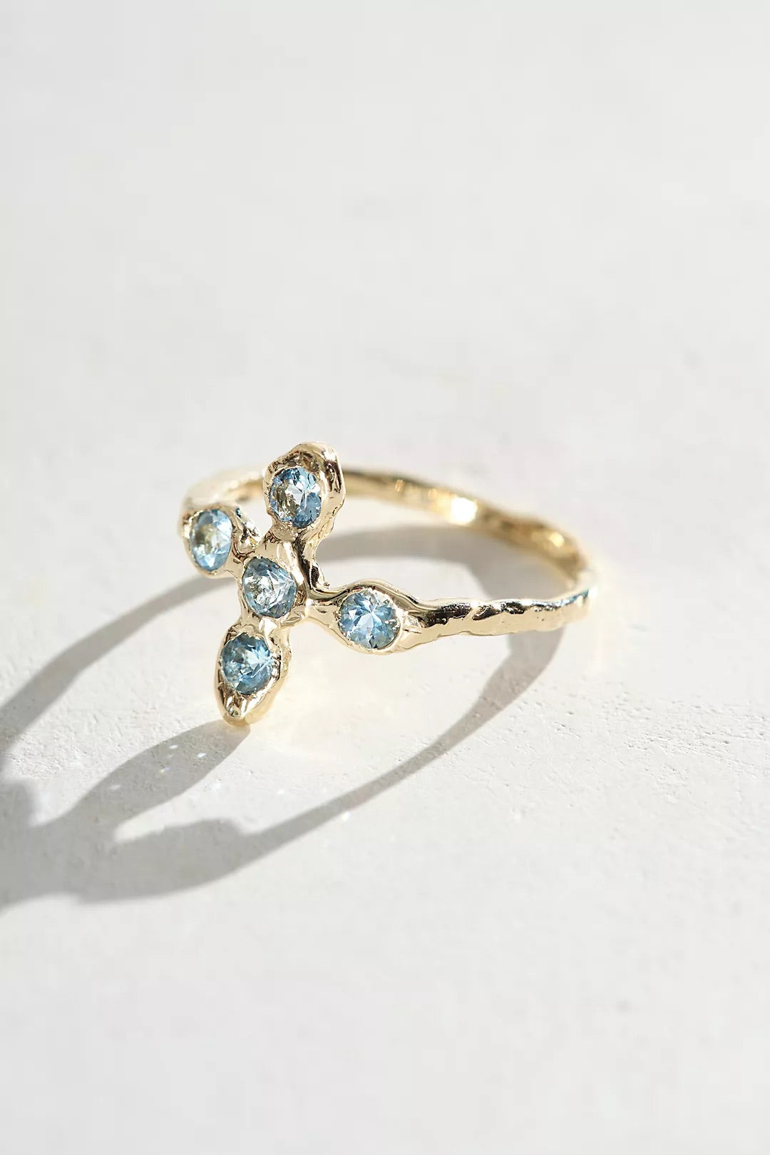 Cross ring with aquamarine stones