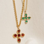 Croix du Sacralité in Garnet; Baby Croix in Emerald
