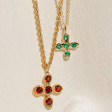 Croix du Sacralité in Garnet; Baby Croix in Emerald