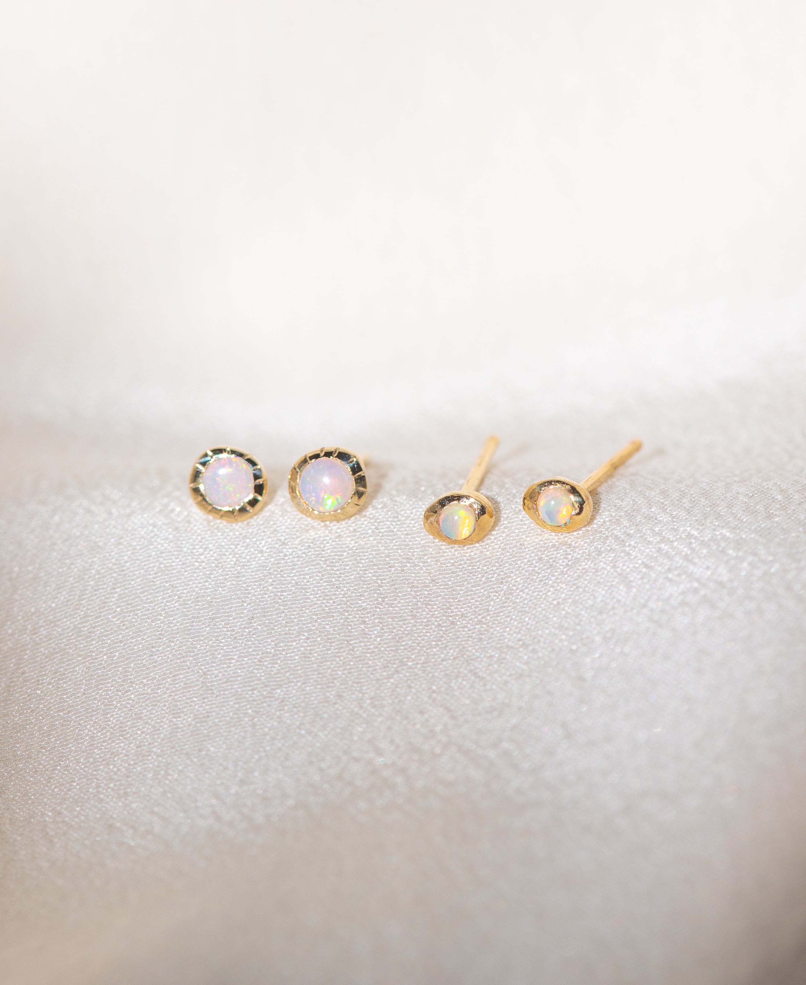 Pair of gold Heirloom Studs and Baby Heirloom Studs with opal stones