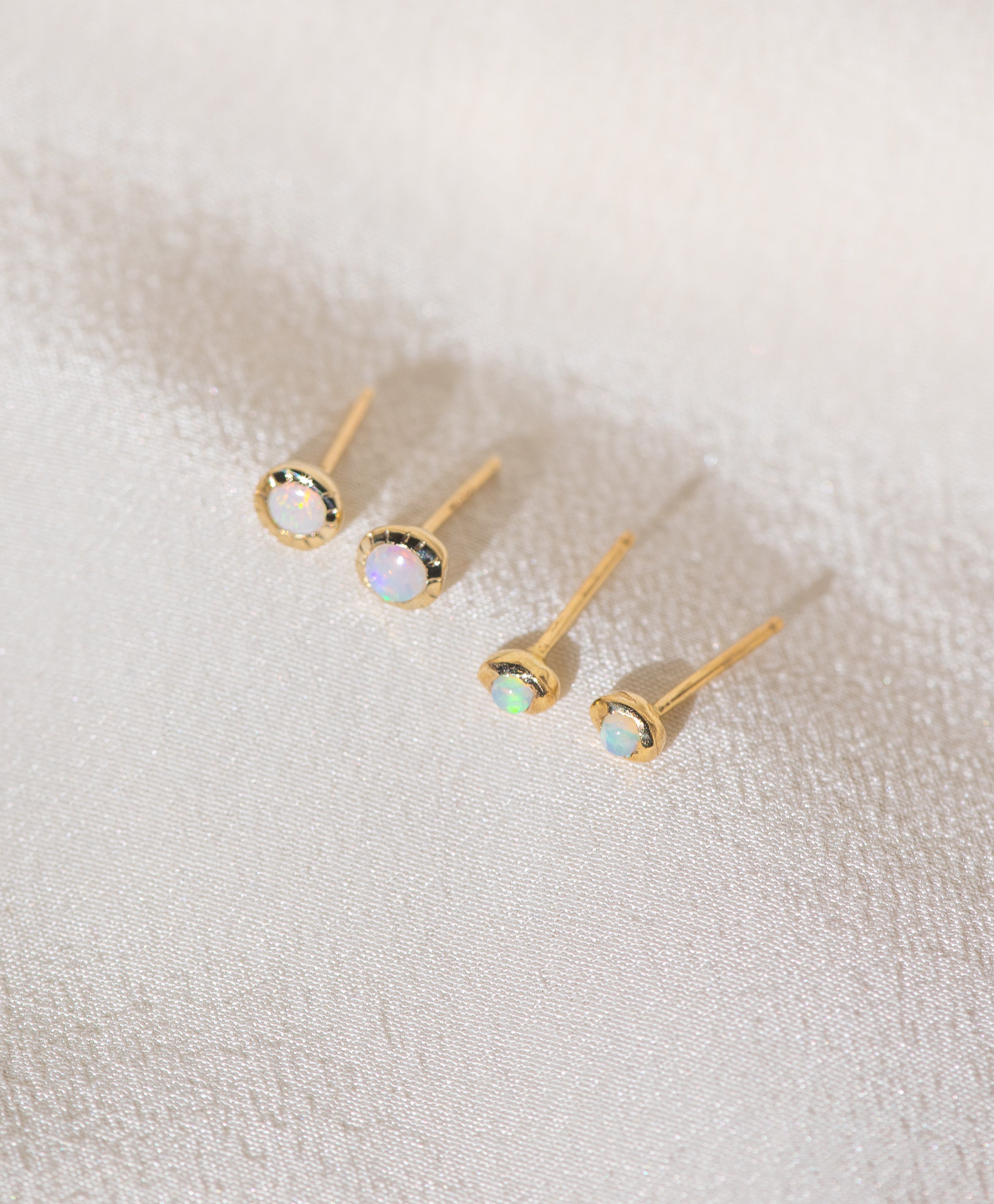 Pair of gold Heirloom Studs and Baby Heirloom Studs with opal stones
