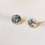 Pair of gold Heirloom Stud earrings with aquamarine stones