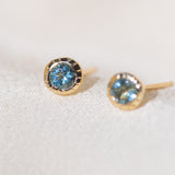 Pair of gold Heirloom Stud earrings with aquamarine stones