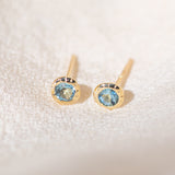 Pair of gold Heirloom Stud earrings with aquamarine stones