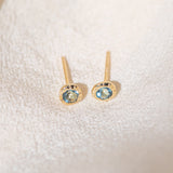Pair of gold Heirloom Stud earrings with aquamarine stones
