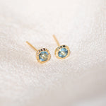 Pair of gold Heirloom Stud earrings with aquamarine stones