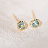 Pair of gold Heirloom Stud earrings with aquamarine stones