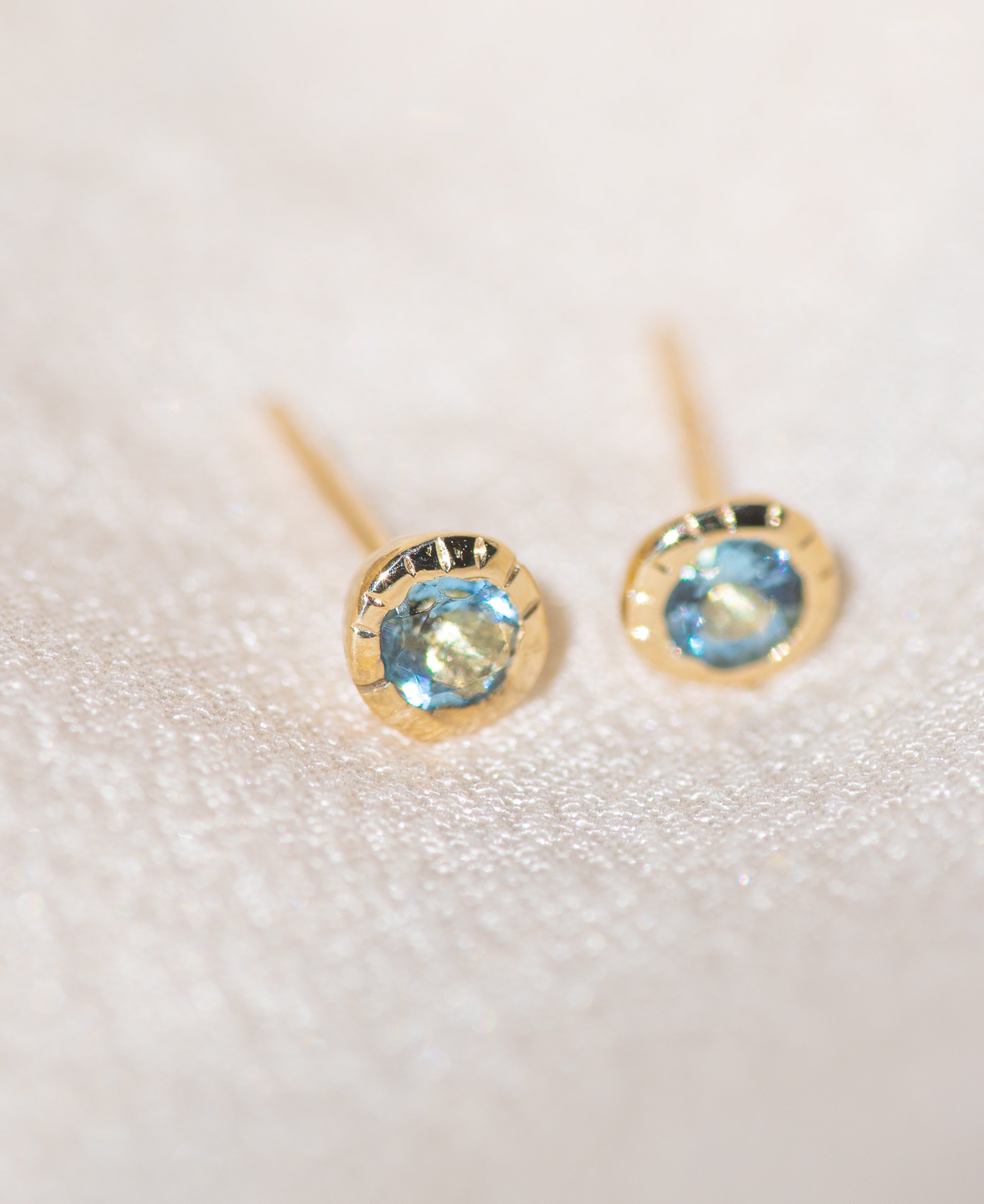 Pair of gold Heirloom Stud earrings with aquamarine stones