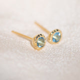 Pair of gold Heirloom Stud earrings with aquamarine stones