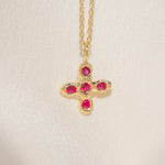 Gold Cross necklace with Ruby Stones