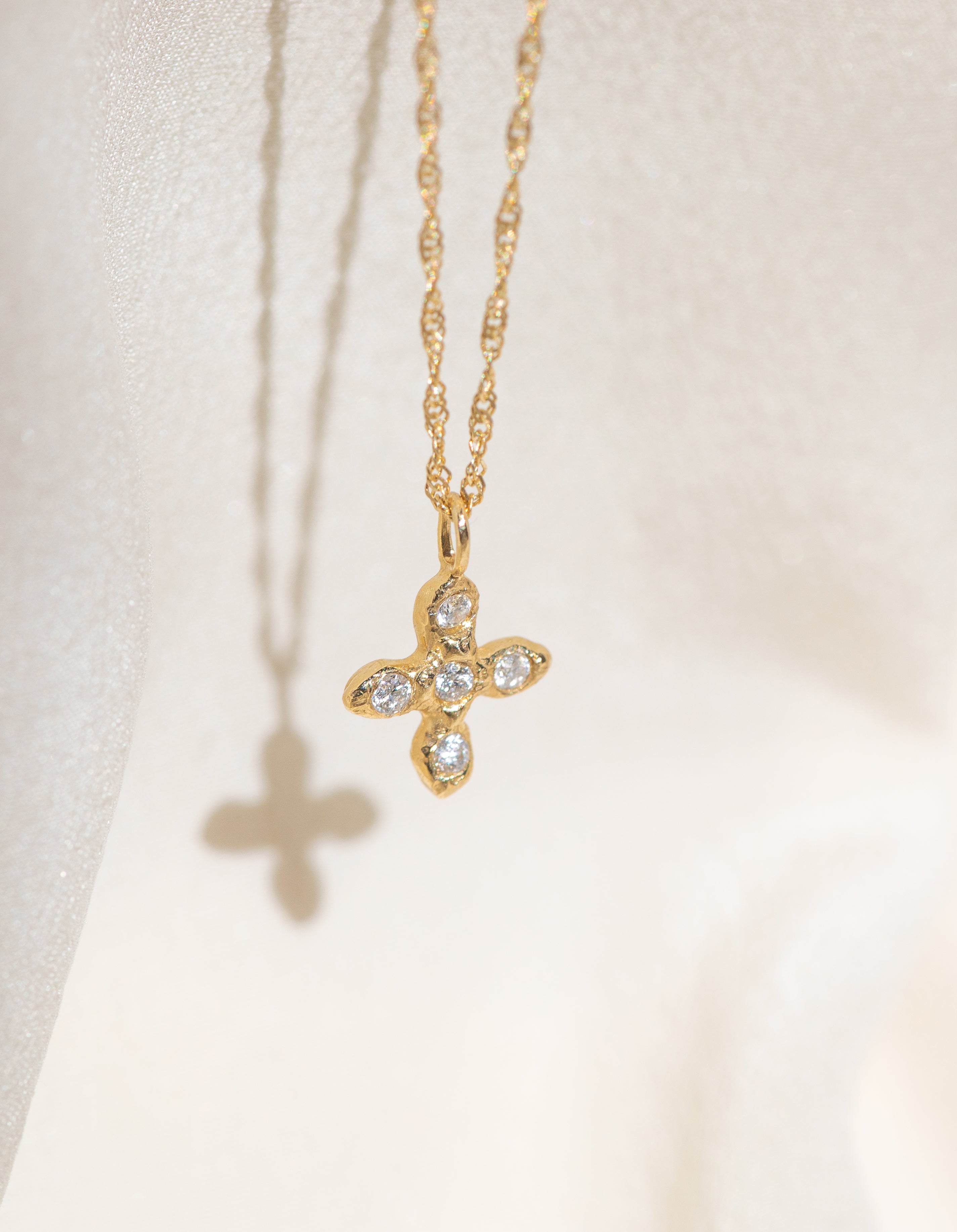 Gold Cross necklace with White Diamond Stones