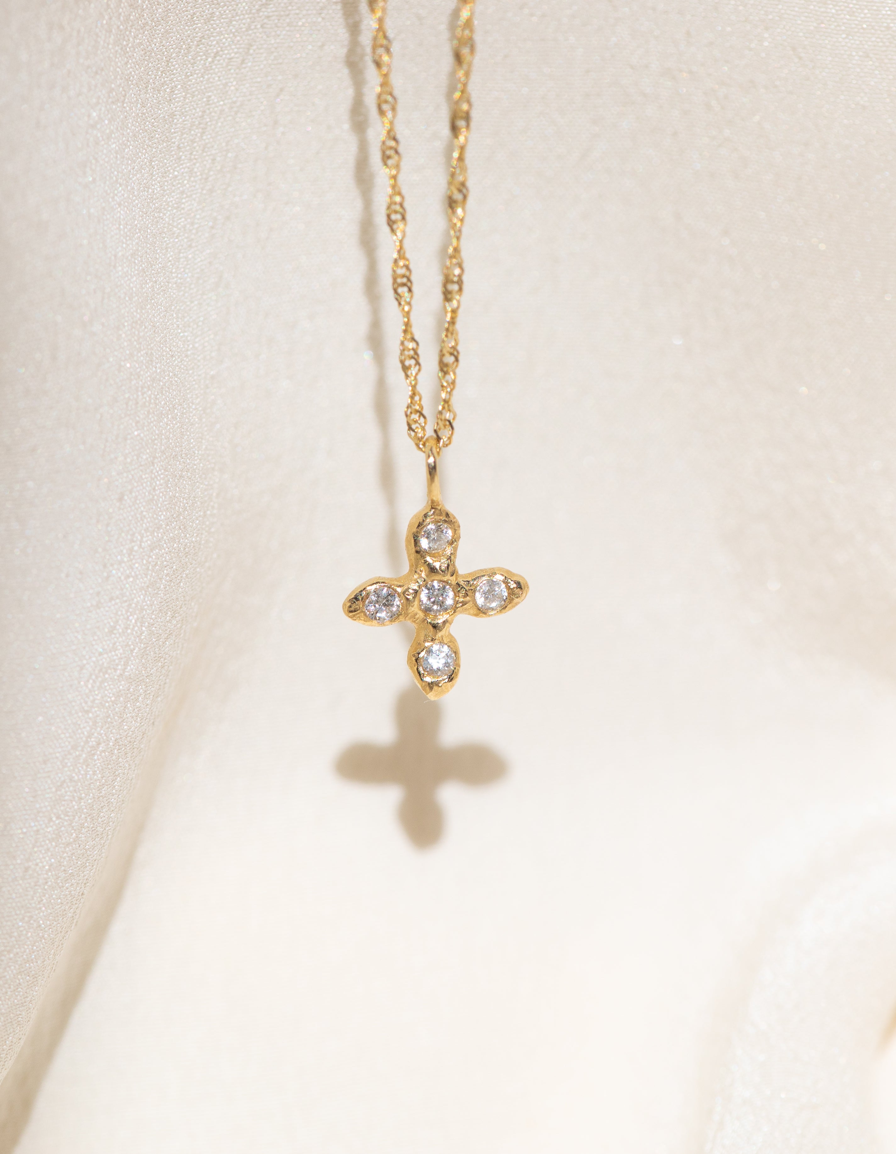 Gold Cross necklace with White Diamond Stones