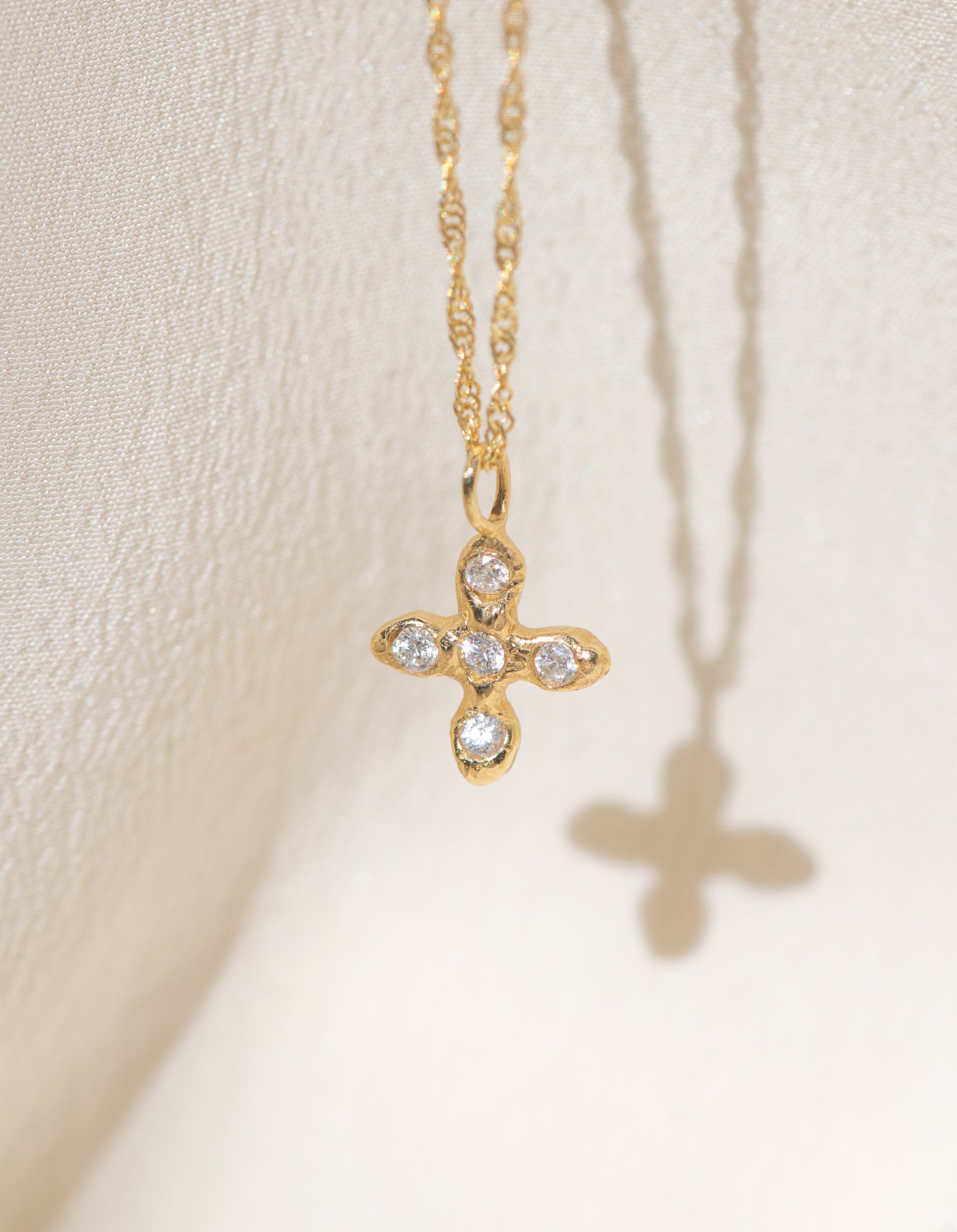 Gold Cross necklace with Black Diamond Stones