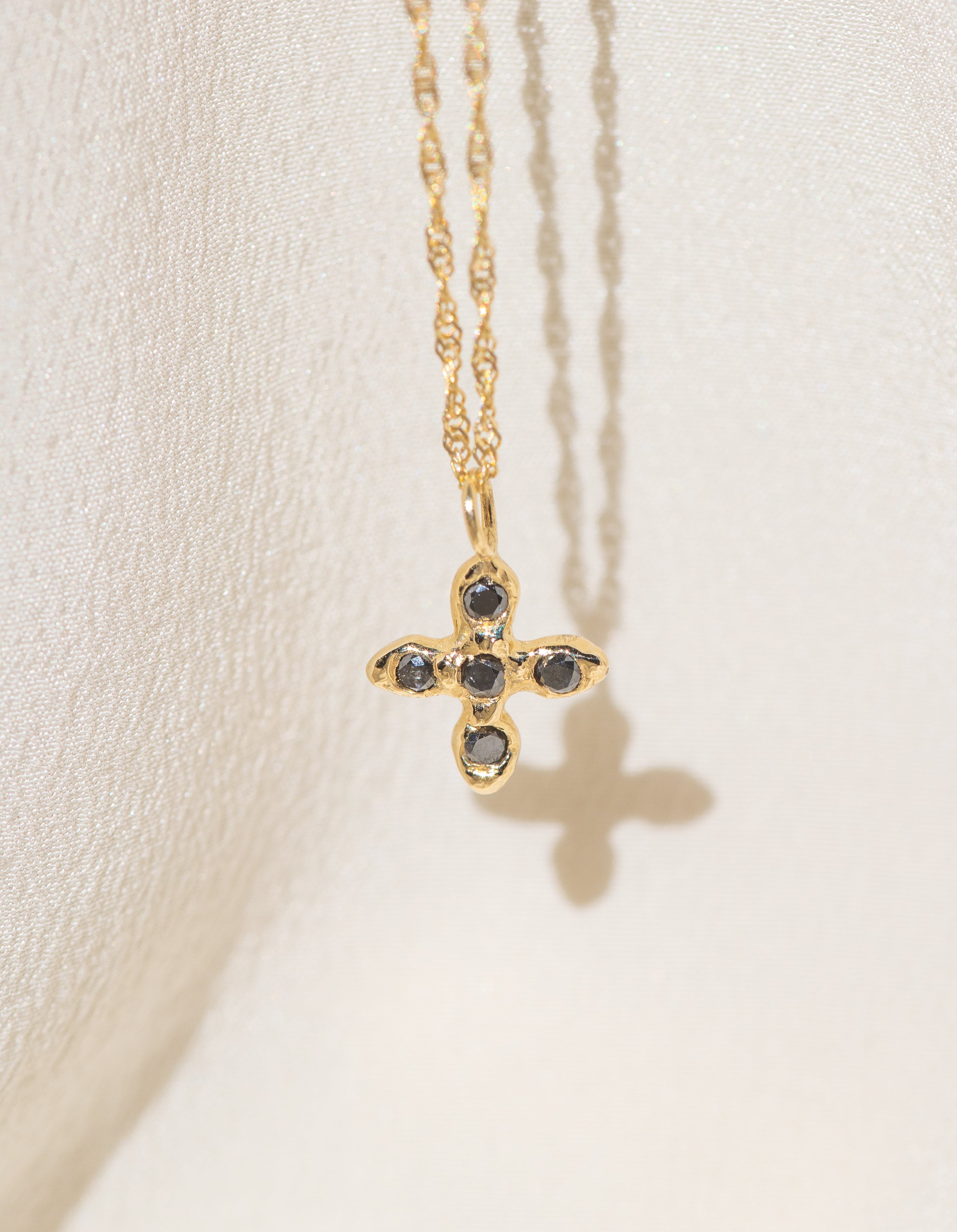 Gold Cross necklace with Black Diamond Stones