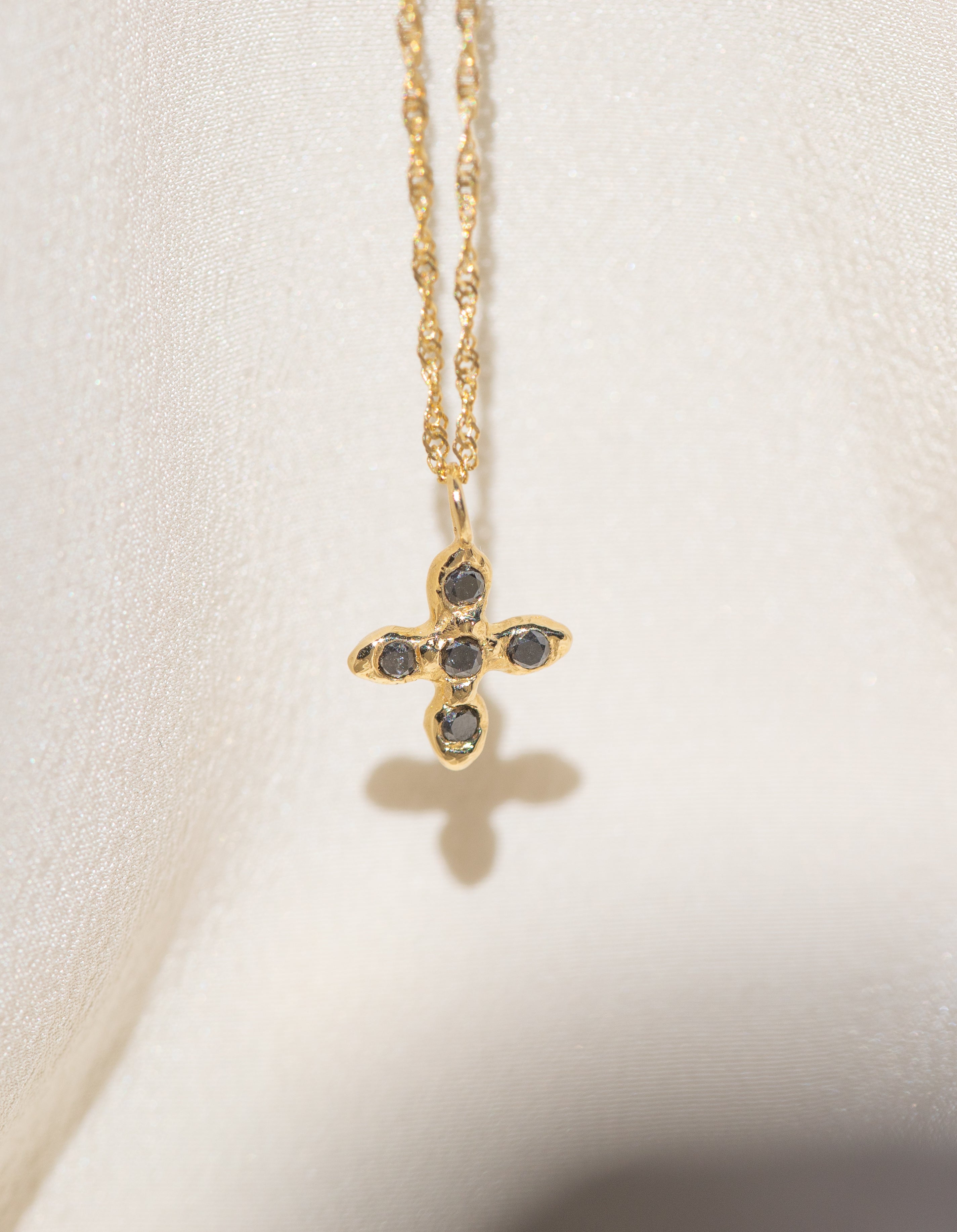 Gold Cross necklace with Black Diamond Stones