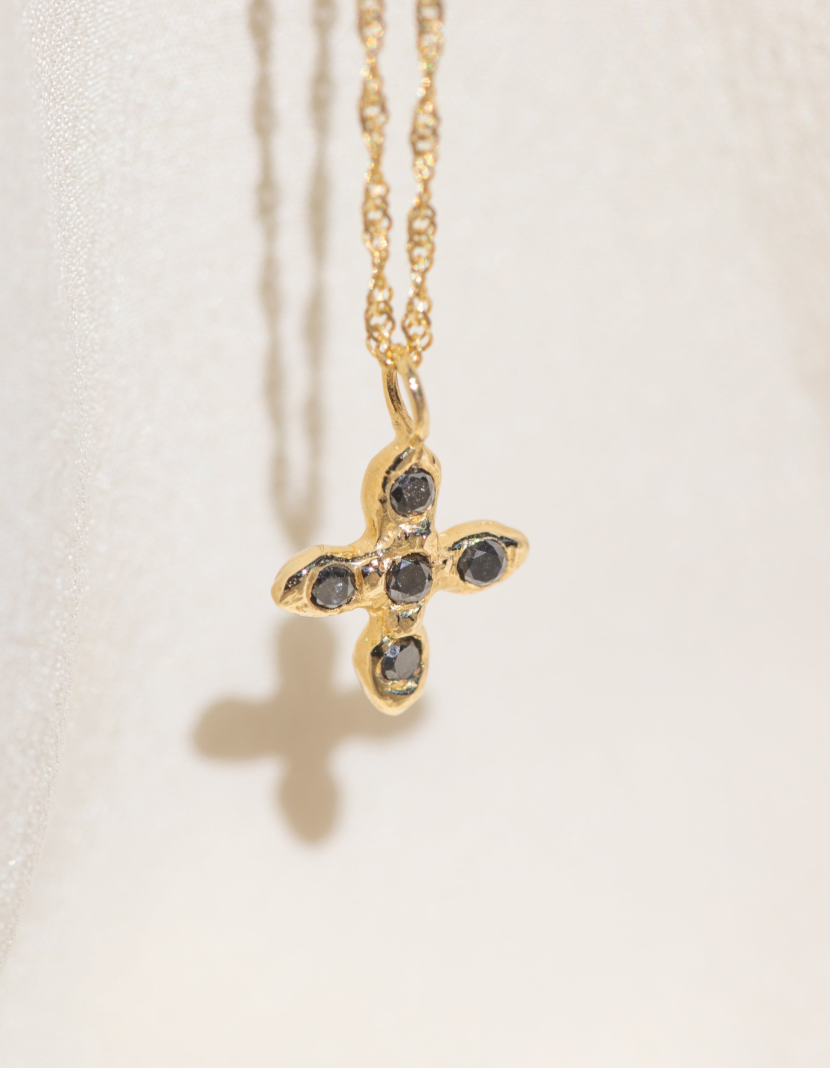 Gold Cross necklace with Black Diamond Stones