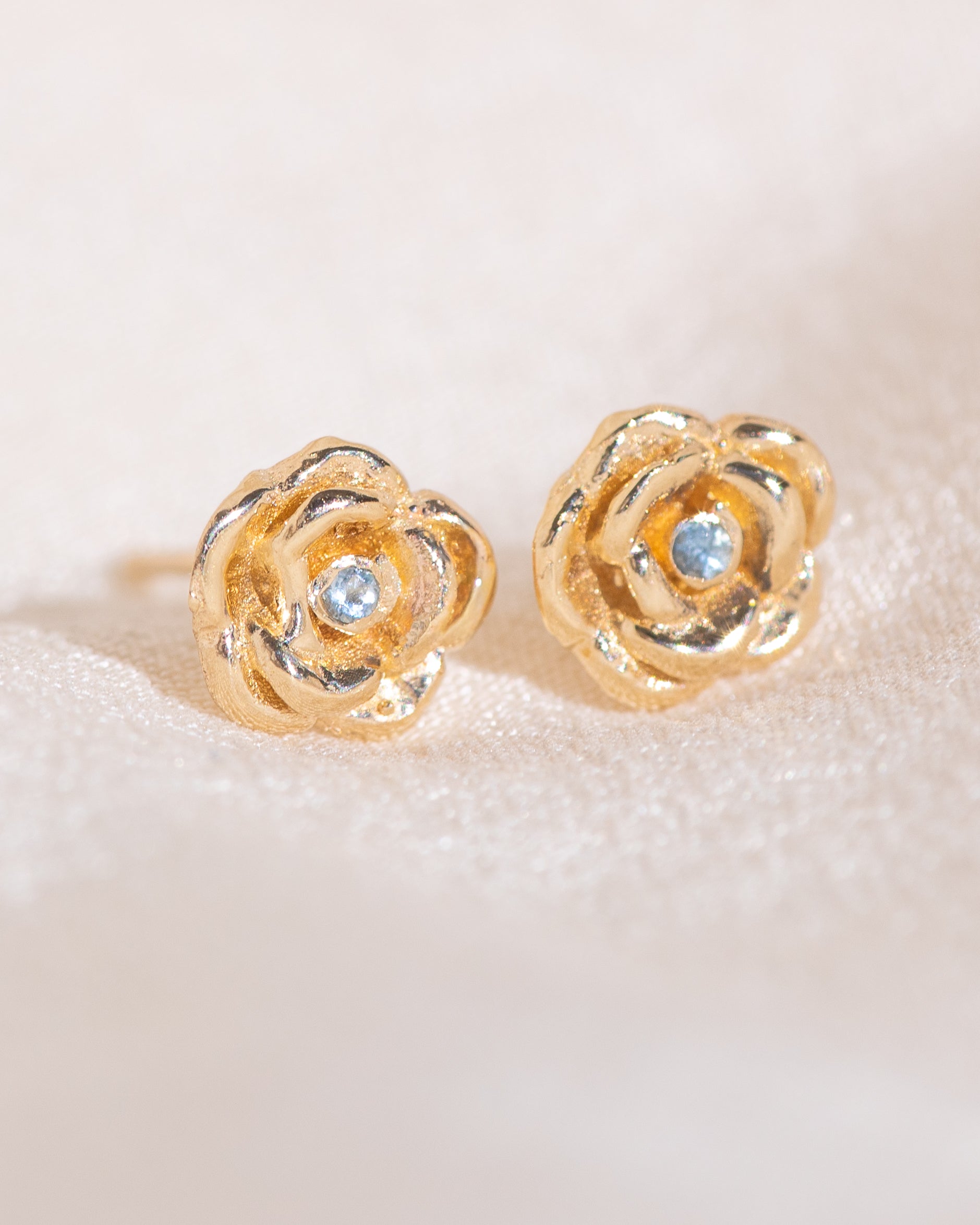 14k gold rose carved studs with aquamarine