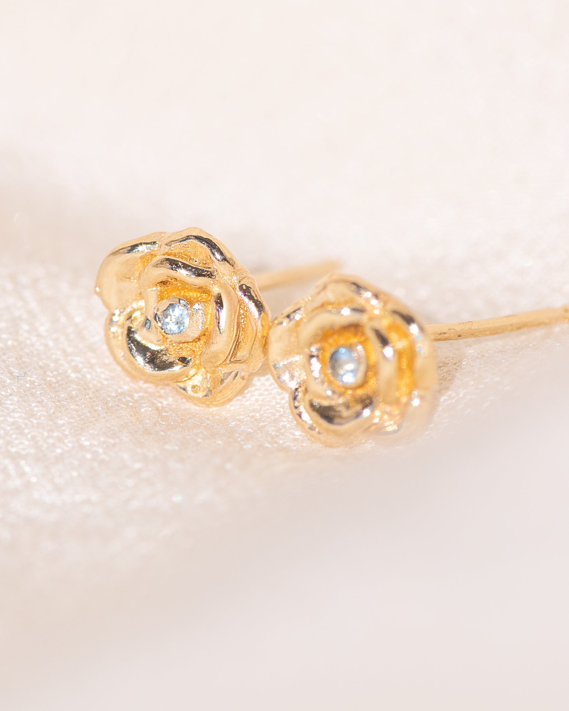 14k gold rose carved studs with aquamarine