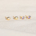 14kt Gold Studs featuring a 2mm Tanzanite and 2mm Opal